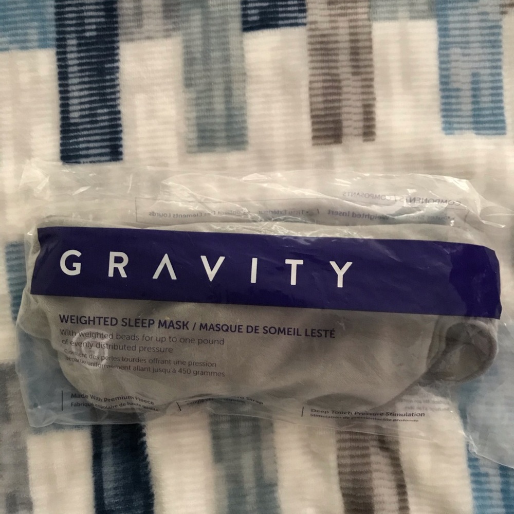 Gravity weighted sleep mask